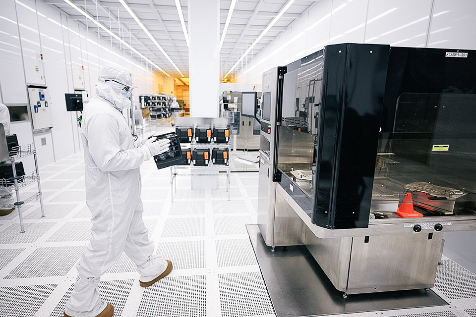 Technician with wafer cassette 