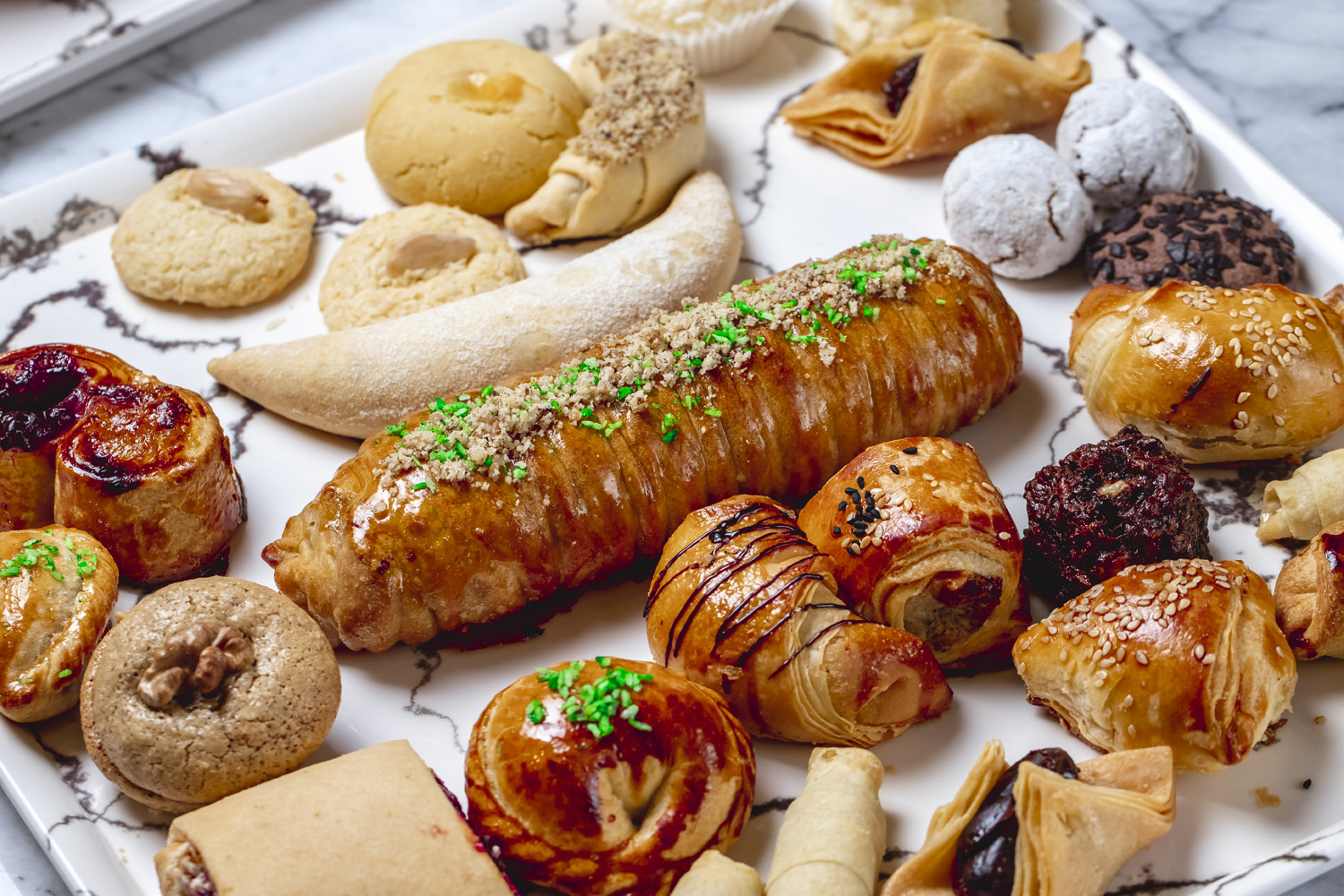 side-view-mix-cookies-with-walnut-chocolate-chips-cottage-cheese-puff-pastry-vanilla-sugar-powder