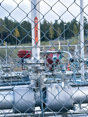 Field network of natural gas pipelines and valves, monitored to prevent leaks. natural gas pipes at a gas site