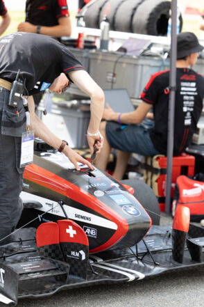 AMZ Racing Car Nera at formula students race in Geschinen Switzerland - mechanics AMZ Racing Car Nera at formula students race in Geschinen Switzerland - mechanics