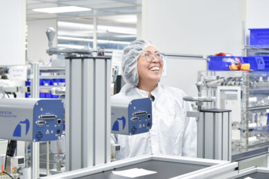 ISS employee in cleanroom ISS employee in cleanroom