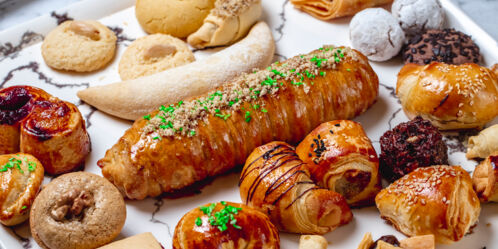 side-view-mix-cookies-with-walnut-chocolate-chips-cottage-cheese-puff-pastry-vanilla-sugar-powder