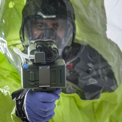 First responder in PPE holding the HAPSITE® CDT Remote Sample Collector
